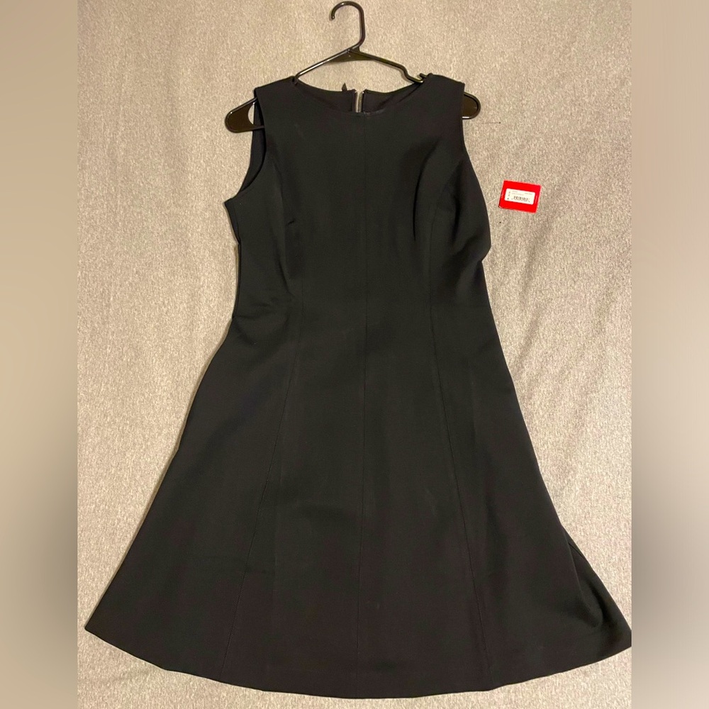 New with tags Spanx “The Perfect Fit and Flare “ In Size Medium Black Dress.